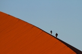 walking safari in Africa red sand dunes